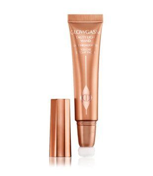 Рідкі рум'яна Charlotte Tilbury Beauty Light Wand Peachgasm 12 мл 3014966063 фото
